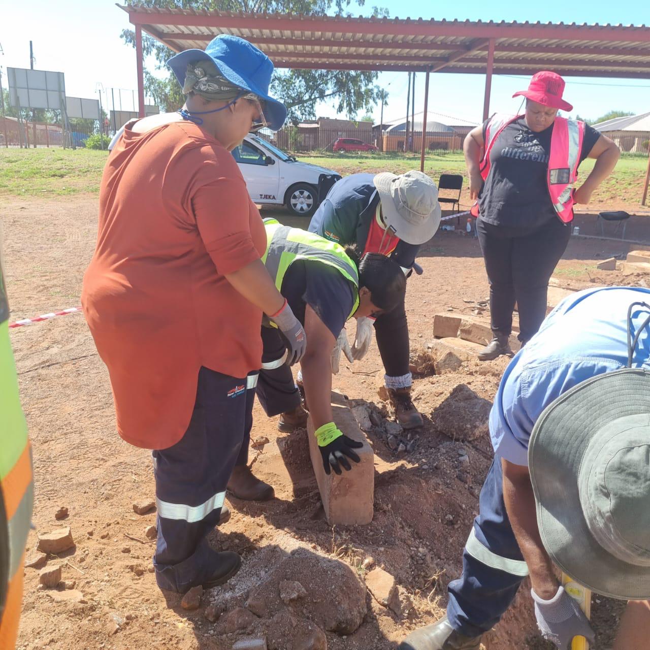 Tshabis team working on construction preparation