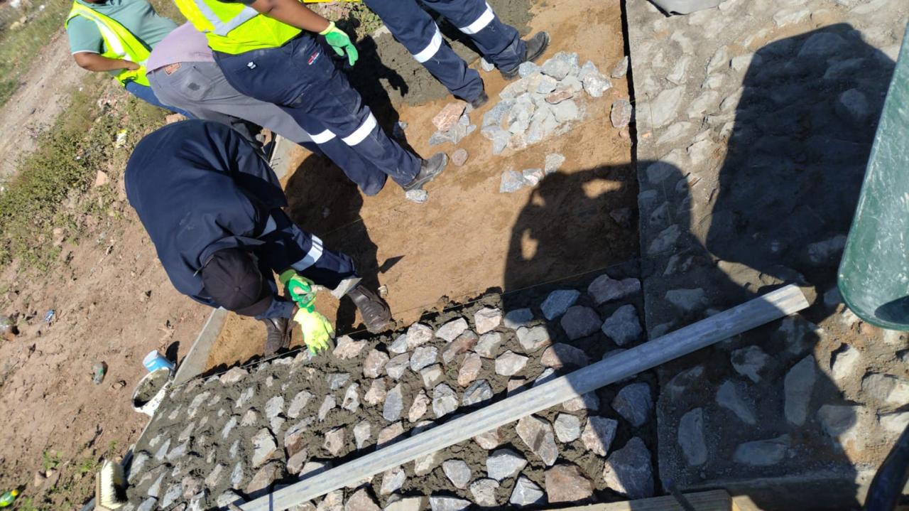 Stone masonry and gabion work in progress